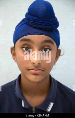 Portrait d'un Sikh Punjabi jeune homme enfant à Hong Kong Banque D'Images