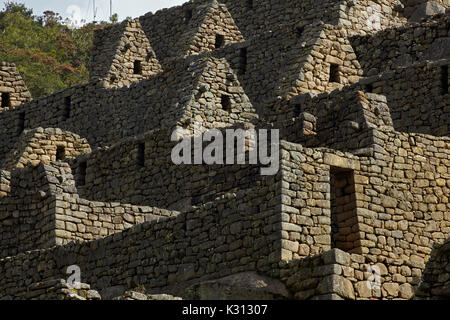 Maisons à Machu Picchu 15e siècle ruines Incas (Site du patrimoine mondial), la Vallée Sacrée, le Pérou, Amérique du Sud Banque D'Images