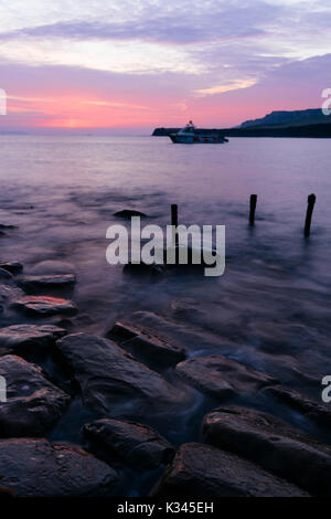 Coucher de soleil sur Kimmeridge Bay, Dorset, Angleterre Banque D'Images