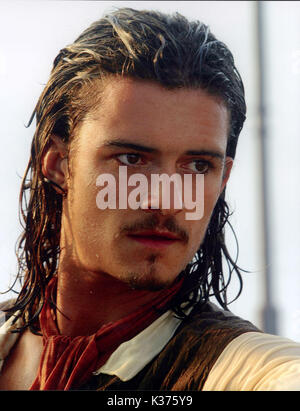 PIRATES DES CARAÏBES : LA MALÉDICTION DU BLACK PEARL Jerry Bruckheimer FILMS/WALT DISNEY PICTURES ORLANDO BLOOM Date : 2003 Banque D'Images