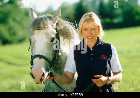 Femme avec cheval Banque D'Images