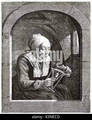 Ancien portrait gravé d'une vieille femme ceinture de threads. Elle est comme une grand-mère affiché dans un cadre de fenêtre. Créé par Girandet après Dow et Wille publié le magasin pittoresque Paris 1839 Banque D'Images