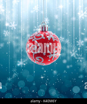 Boules de Noël et flocons de flou artistique sur fond bleu Banque D'Images