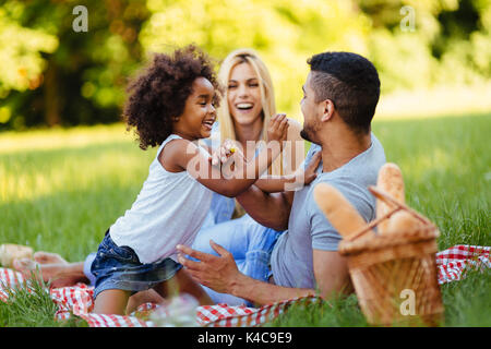 Happy Family having fun time on picnic Banque D'Images