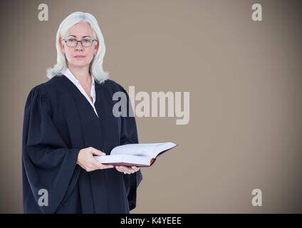 Digital composite de femme juge avec livre ouvert contre fond brun Banque D'Images