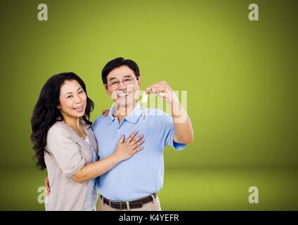 Digital composite de couple maintenant la touche en face de vignette Banque D'Images