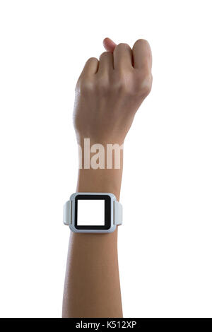 La main de femme montrant smartwatch against white background Banque D'Images