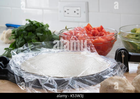 Avec des tortillas de farine et la pâte masa marina, la presse tortilla tortilla pressé Banque D'Images