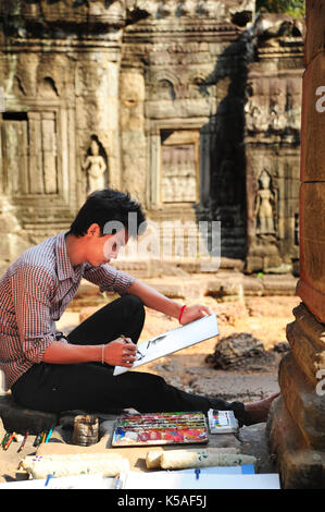 Siem Reap, Cambodge - Feb 10,2013:peinture Artiste en ruines d'Angkor Wat, Siem Reap, Cambodge. Banque D'Images