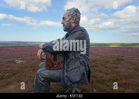 Homme assis Banque D'Images