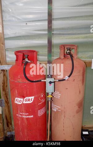 Bonbonnes de gaz propane pour chauffer une poly tunnel. lydcott une pépinière, Mid Devon, Royaume-Uni. août, 2017. Banque D'Images