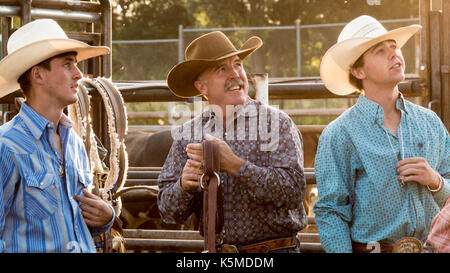 Rodeo Cowboys authentique trois à sortir du cadre traditionnel habillé en attente d'usure de l'ouest Banque D'Images