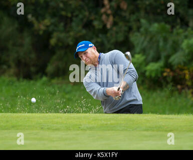 John Hartson jouer au golf Banque D'Images