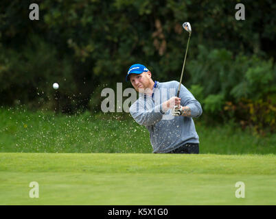 John Hartson jouer au golf Banque D'Images