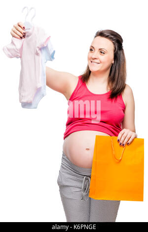 Happy pregnant lady choisit de caisse pour un garçon ou une fille sur un fond blanc Banque D'Images