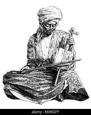 REBAB (Saoudite/Perse/Égypte) arabe jouant rebab. ancien instrument s'inclina Banque D'Images