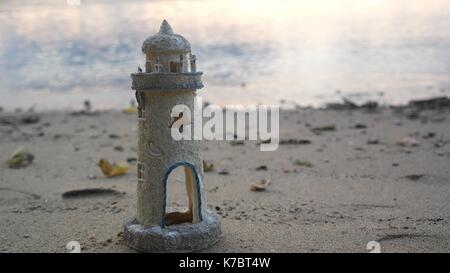 Le phare sur la plage Banque D'Images