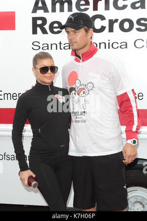 Josh Duhamel et Stacy 'Fergie' Ferguson en vedette lors de l'examen spécial de Los Angeles de Neuf Personnes Qui S'Est Tenu au Mann Village Theatre de Westwood, Californie, le 09 décembre 2009 RTNRD / MediaPunch Banque D'Images