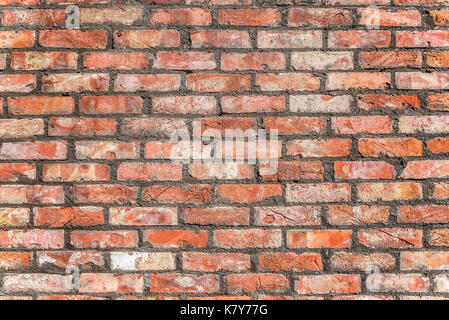 La texture du mur de brique rouge grunge background. Banque D'Images