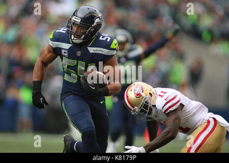 17 septembre 2017 : San Francisco 49ers wide receiver Marquise Goodwin (11 hits) Seattle Seahawks linebacker Bobby Wagner (54) après une interception lors d'un match entre les San Francisco 49ers et les Seahawks de Seattle à CenturyLink Field à Seattle, WA, le 17 septembre 2017. Sean Brown/CSM Banque D'Images