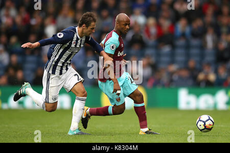 West Bromwich Albion's grzegorz krychowiak (à gauche) et West Ham United's andre ayew bataille pour la balle Banque D'Images