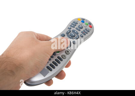 Cropped hand holding remote control against white background Banque D'Images