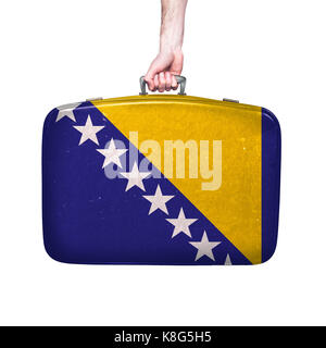 Bosnie drapeau sur une valise en cuir vintage. Banque D'Images