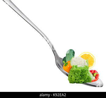 Des légumes sur la cuillère d'aliments sains. Banque D'Images