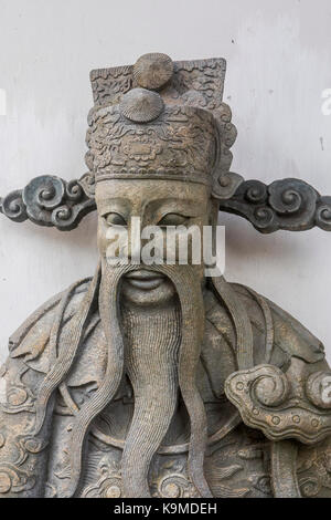 Détail de sculpture, jardin à Wat Pho (Wat po), Temple du Bouddha couché, Bangkok, Thaïlande Banque D'Images