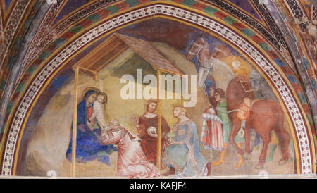 Renaissance fresque représentant une scène de l'Épiphanie, la visite des trois rois, dans l'église collégiale de san gimignano, Italie. Banque D'Images