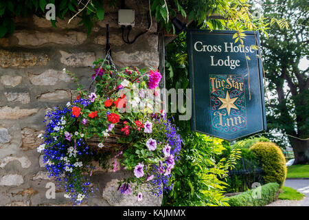 Le star inn et cross house lodge sign, harome, Yorkshire du nord Banque D'Images