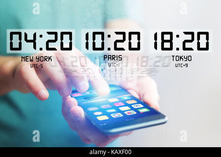 Concept jet lag avec différents temps 24h sur un smartphone Banque D'Images