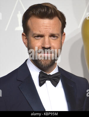 Jason Sudeikis pose dans la salle de presse lors du 86e prix annuel de l'Académie à l'hôtel Loews Hollywood le 2 mars 2014 à Hollywood, Californie. Banque D'Images