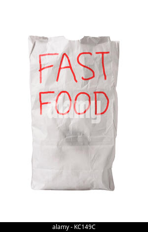 Un petit sac de papier blanc froissé, avec quelques taches de graisse, de "fast food" avec écrit dessus en grosses lettres rouges, isolated on white Banque D'Images
