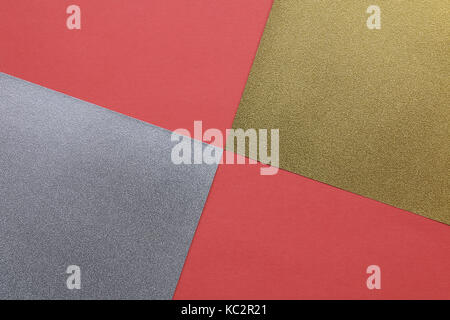 Or argent texture du papier sur rouge Banque D'Images