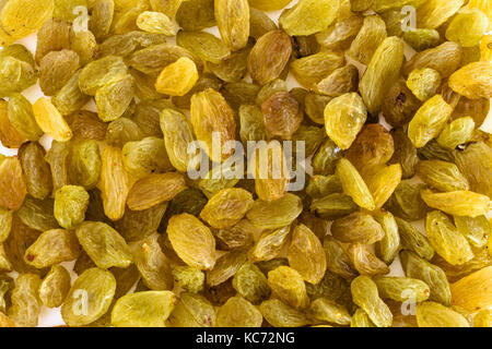 Jaune d'or rempli de raisins secs comme arrière-plan Banque D'Images