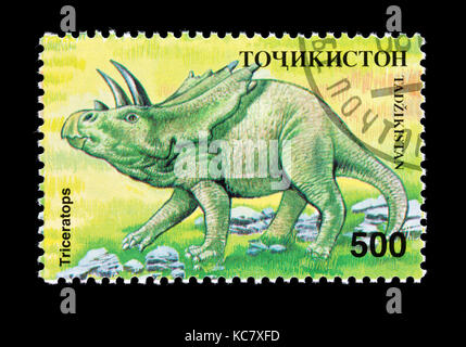 Le Tadjikistan de timbre-poste représentant un triceratops Banque D'Images