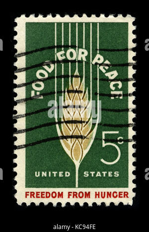 USA - CIRCA 1960 : un timbre imprimé aux USA montre l'image du dédié à la Food for Peace vers 1960. Banque D'Images