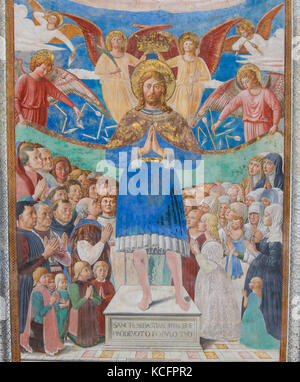 Fresque de saint Sébastien avec les fidèles dans l'église de Sant'Agostino à San Gimignano, Toscane, Italie, créé par Benozzo Gozzoli en 1464. Banque D'Images