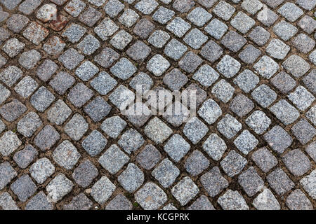 carrelage en asphalte carré gris. Photographié en gros plan. Banque D'Images