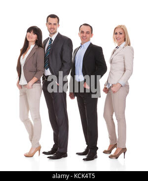 Portrait of happy young group over white background Banque D'Images