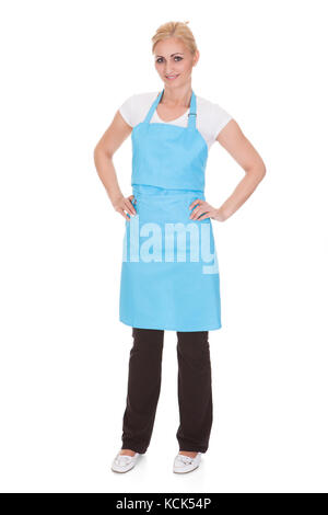 Happy Woman Wearing Tablier de cuisine sur fond blanc Banque D'Images