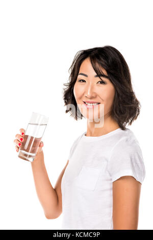 Femme avec de l'eau en verre Banque D'Images