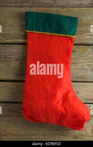 Close-up of Christmas stocking sur planche en bois Banque D'Images