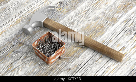 Marteau et fort avec des clous sur le vieux fond de bois Banque D'Images