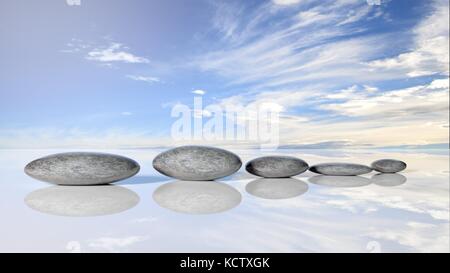 Rangée de pierres zen de grande à petite dans l'eau reflétant le ciel paisible avec des nuages. Banque D'Images