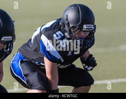 L'action de football avec trinity vs. university prep high school à Redding en Californie. Banque D'Images