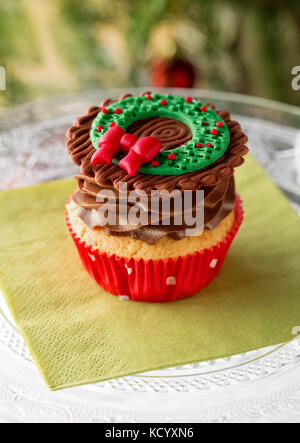 Cupcake chocolat décoré de symbole Banque D'Images