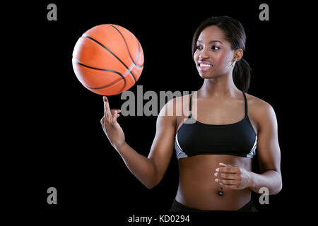 Basket-ball la balle tourne sur son doigt Banque D'Images