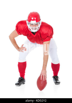Portrait de joueur de Rugby en position d'attente sur fond blanc Banque D'Images